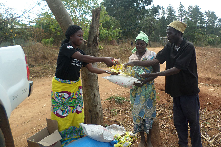 DAPP Field Officer Distributing Food Items To TB Patients In Thyolo District